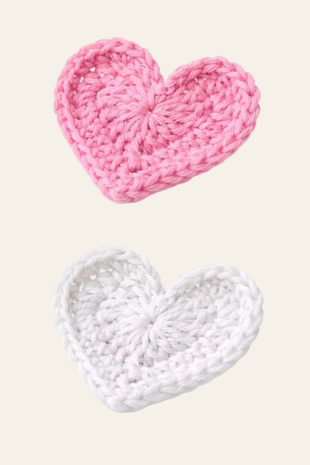 Easy crochet heart PDF pattern — multiple finished crochet hearts in pink and red showing color variations and size