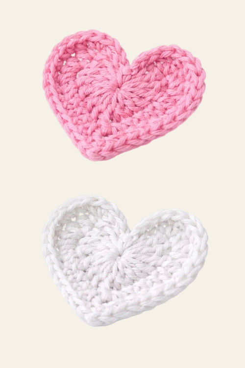 Easy crochet heart PDF pattern — multiple finished crochet hearts in pink and red showing color variations and size