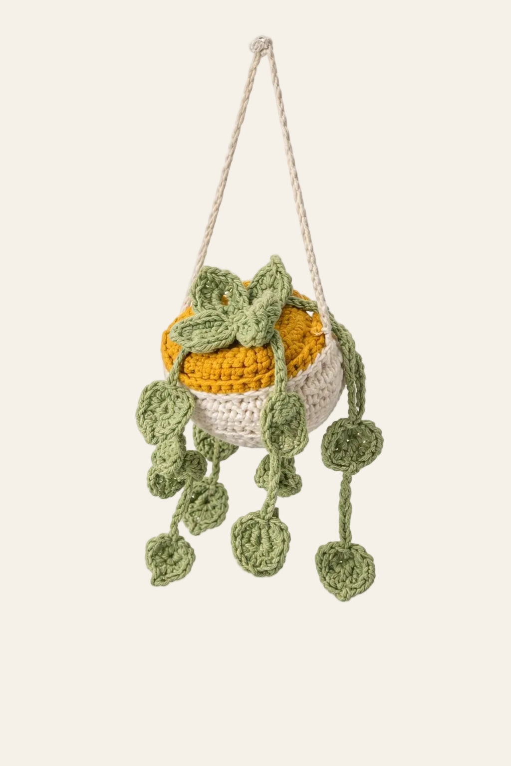 Crochet money plant pattern — handmade trailing hanging plant cascading from a planter pot for boho home decor