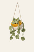 Crochet money plant pattern — handmade trailing hanging plant cascading from a planter pot for boho home decor