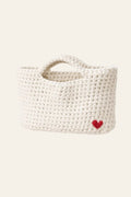 Crochet mini tote bag pattern with subtle heart detail — minimalist handmade purse in cream cotton yarn