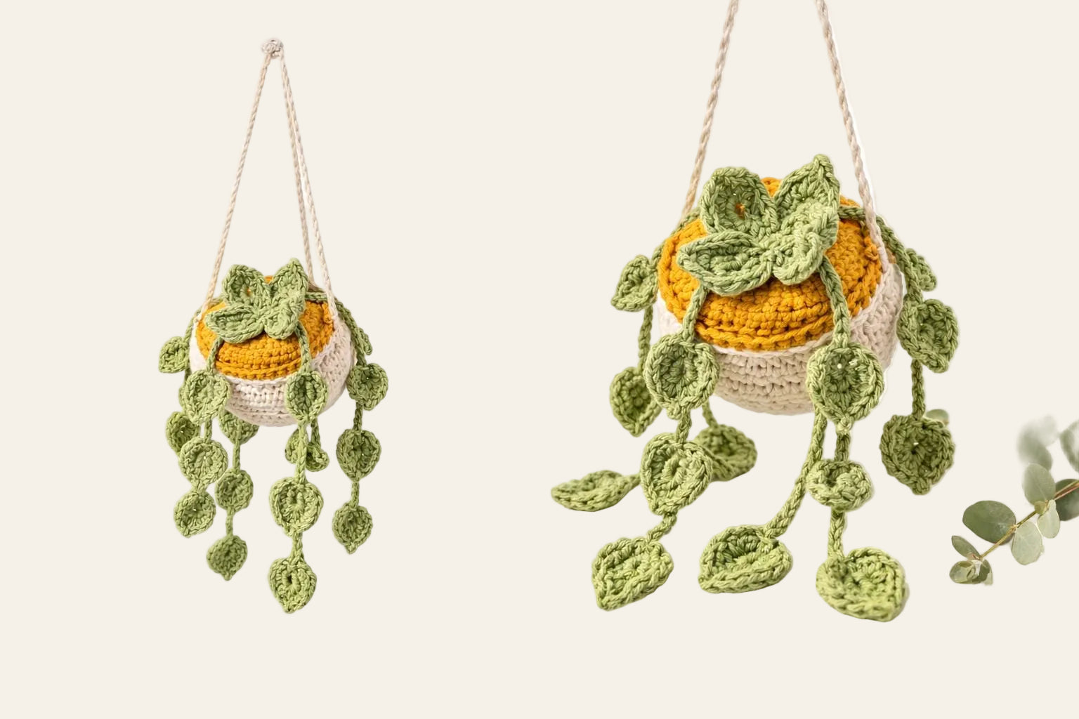 Close-up of crochet money plant leaves in green cotton yarn showing the leaf shape and stitch detail