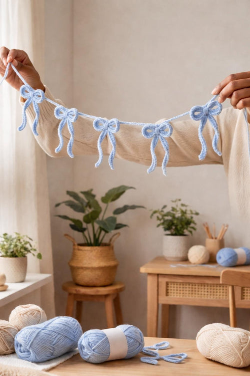Crochet bow garland pattern — three handmade bow variations strung together as a coquette nursery and bedroom garland