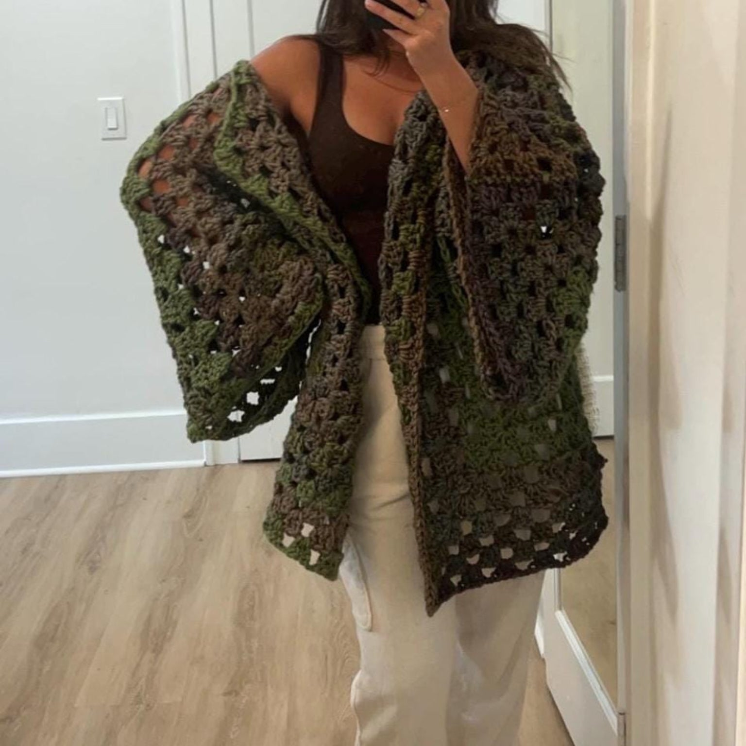 Granny stitch crochet cardigan pattern — handmade boho-inspired sweater modeled with cozy fall styling