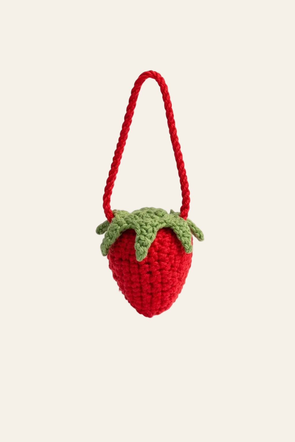 Beginner crochet strawberry charm PDF preview showing the body and leaf cap before assembly